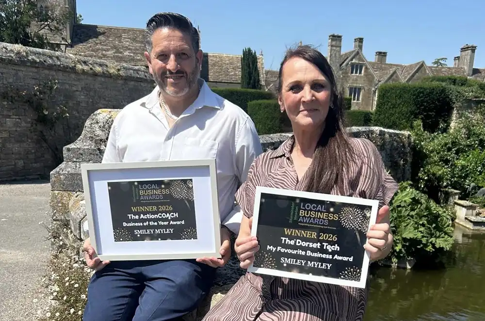 Tim and Claire Downer proudly displaying their Sturminster Newton Business Awards