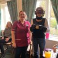 Staff at The Malthouse care home in Gillingham using a GERT age simulation suit