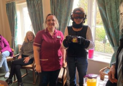 Staff at The Malthouse care home in Gillingham using a GERT age simulation suit