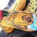 The hand-painted football boots feature Argentina star Lionel Messi
