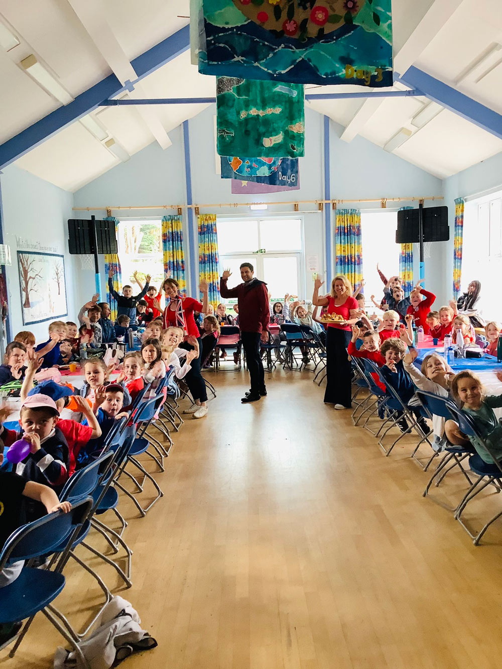 Pupils at St Andrew’s Primary in Fontmell Magna celebrated with a lunch ‘fit for a king’ while wearing their red, white and blue outfits. They sang to families at the end of the day accompanied by keyboard and trumpet plays with a coronation song and a rousing rendition of the national anthem; in true British style they sang on through the rain. All the children created coronation artwork which was displayed for all to enjoy at The Springhead Trust. There were portraits of pupils as young kings and queens, designs for the royal carriage, and abstract pictures of the King. 