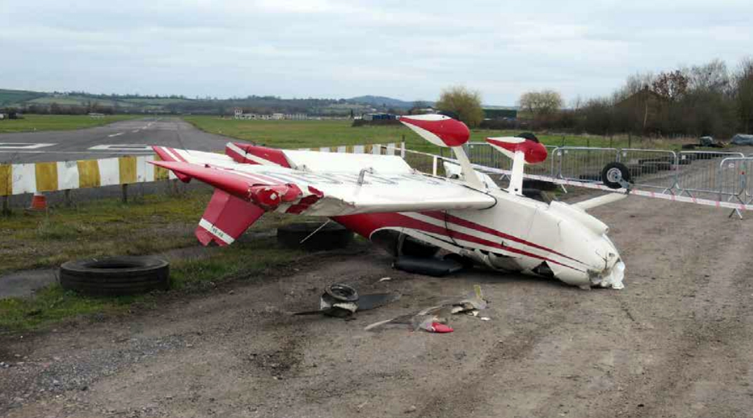 The plane ended up on its roof after the collision, which happened as it came into land at Henstridge. Picture: AAIB