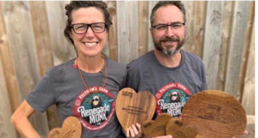 Penny and Marcus with their awards