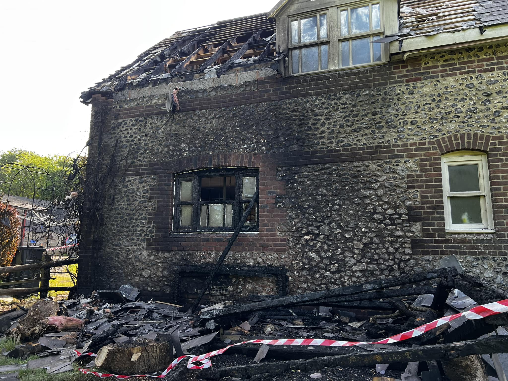 The damaged house in Piddletrenthide. Pictures: DWFRS