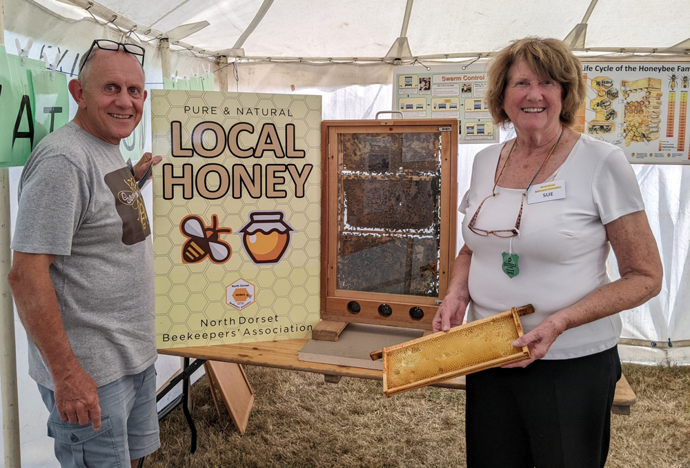North Dorset Beekeepers Association membership secretary James Nalty and committee member Sue Billington, in the Bees and Honey Marquee