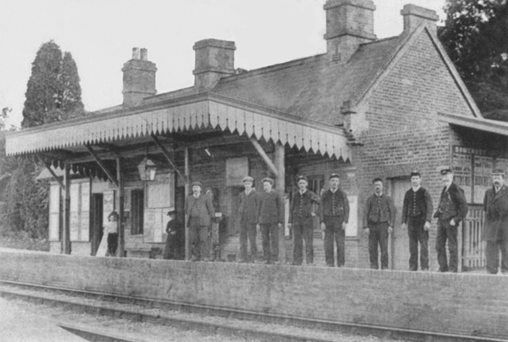 On parade in a very early photograph are the station master and eight members of the station team from the 1900s, courtesy Alan Hammond