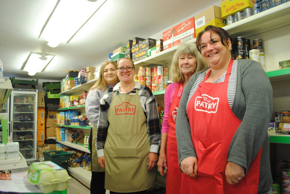 Pantry volunteers, from left: Paige Hancock, Tracey Foster, Caroline Payne and Hayley Lane