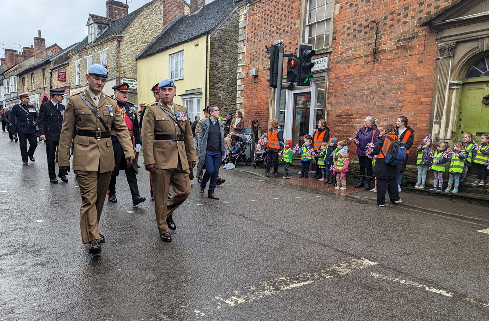 Officers make their way to their podium and seating 