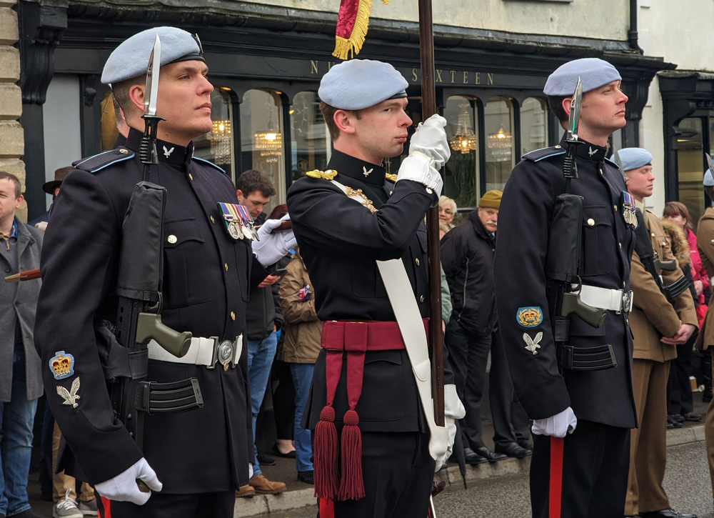 The flagbearers cast an eye around the onlooking crown