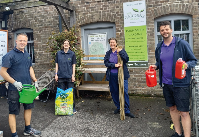 From left: Jon Nash and Katy Bidwell from Poundbury Gardens donating sunflower-growing supplies to Katie Adair-Charlton and Paul Myatt from Dorset County Hospital Charity’s Kingfisher Ward Playteam