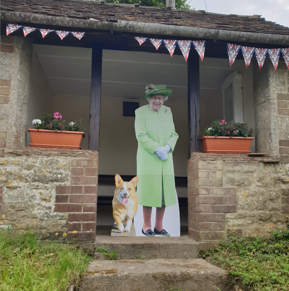 Her Majesty waits patiently at the bus stop in Milton Clevedon: thieves tried to steal her, but God save the Queen!