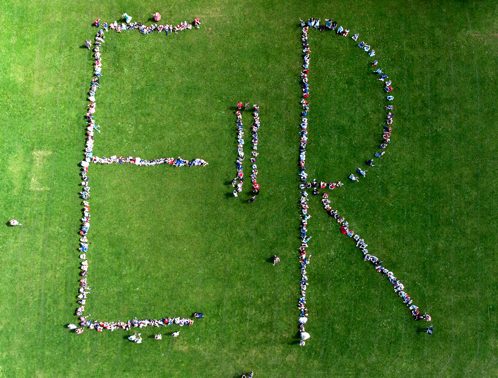 More than 300 children from Sherborne Primary created this aerial artwork, then celebrated with a playground picnic 